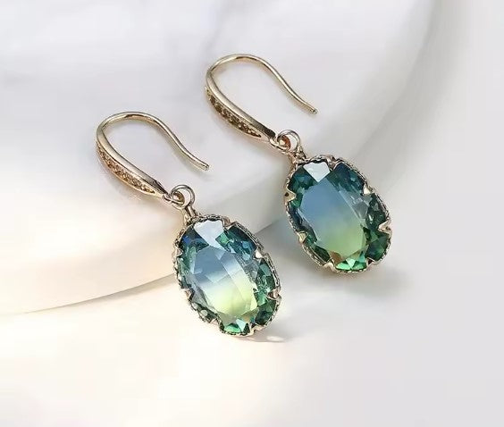 Exquisite Oval Inlaid with Blue Green Zircon Earrings