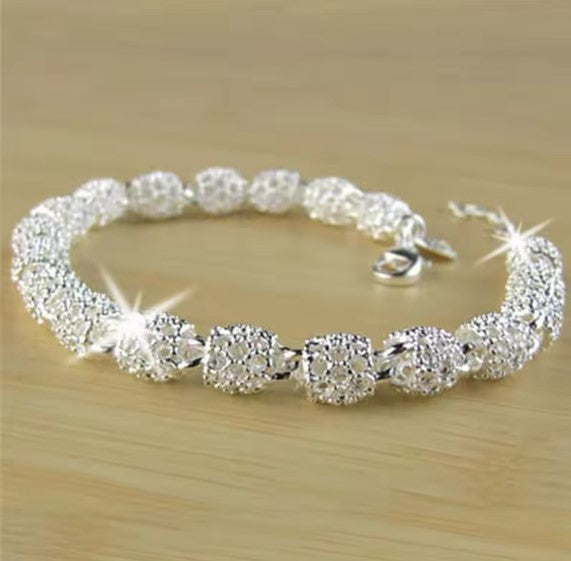 Silver Hollow Lantern Ball Charm Bracelet
